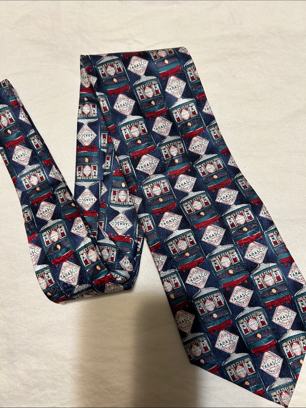 Tabasco Navy Blue Silk Tie with Red and White Bottle Pattern